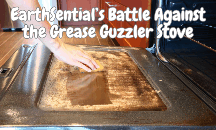 A greasy stove being cleaned with EarthSential Essential Oil Cleaner