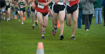 Cross country runners racing for the win, Spotless Cross Country Uniform and Sneakers