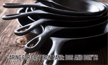 a stack of clean cast iron pans