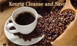 a freshly brewed cup of coffee with some coffe beans