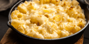 creamy baked mac and cheese in a cast iron pan, caring for cast iron pans do's and don'ts