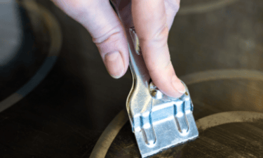 the razor technique for glass stove top cleaning