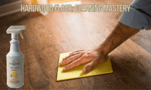 a person washing a hardwood floor with a microfiber cloth and a bottle of EarthSential All Purpose Cleaner