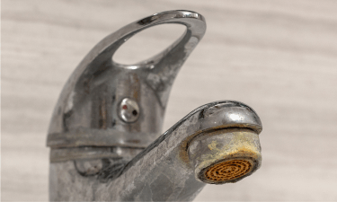 remove hard water stains naturally