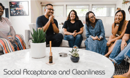 a group of people sitting on couches, smiling and talking. Let's unravel the emotional journey entwined with social acceptance and cleanliness and explore how deeply it shapes our social world.