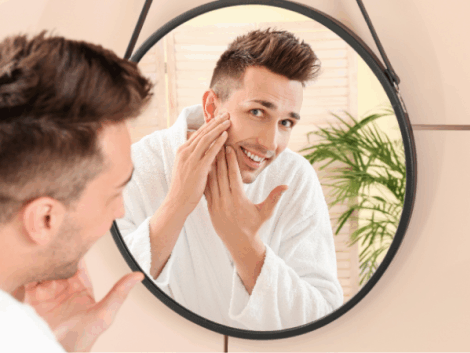 mirror cleaning made easy, a man looking in the mirror