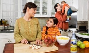 family in kitchen with food prep kitchen cleaner